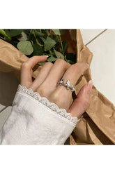 Bague ajustable en perles et fleurs